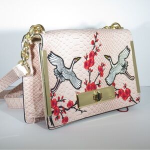 Rare ALDO embroidered crane purse mint condition